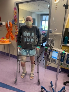 Savannah Gunn using a walker in the hospital